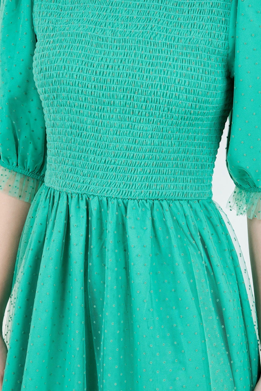 Embraced In Tulle In Emerald Green