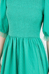 Embraced In Tulle In Emerald Green