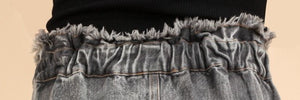 Frayed Waist band with elastic . Back of the skirt