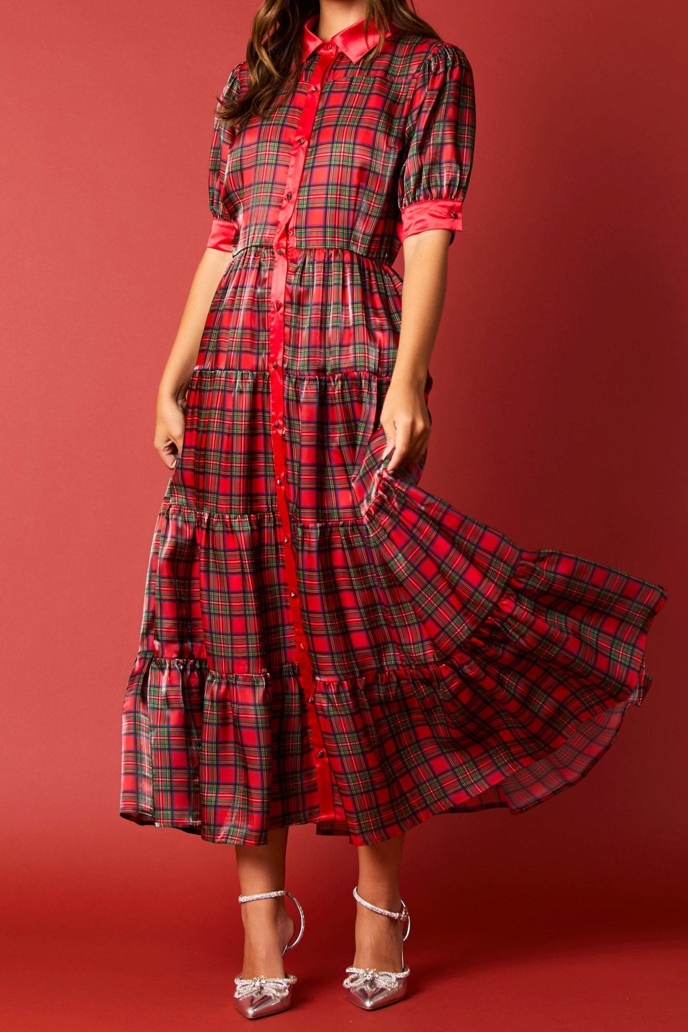 Holiday Festivity Dress - Midi Length
Red Multi Tartan Plaid Print, Polyester, Classic and Flowy Fit with Slight Stretch, Puff 3/4 Length Sleeves with Plaid Printed Button on Cuffs. Collared Neckline, Button Front with Buttons Down Length of Front of Dress - Buttons are Plaid Print, Silky Finish, Elastic Waist, Tiered Style