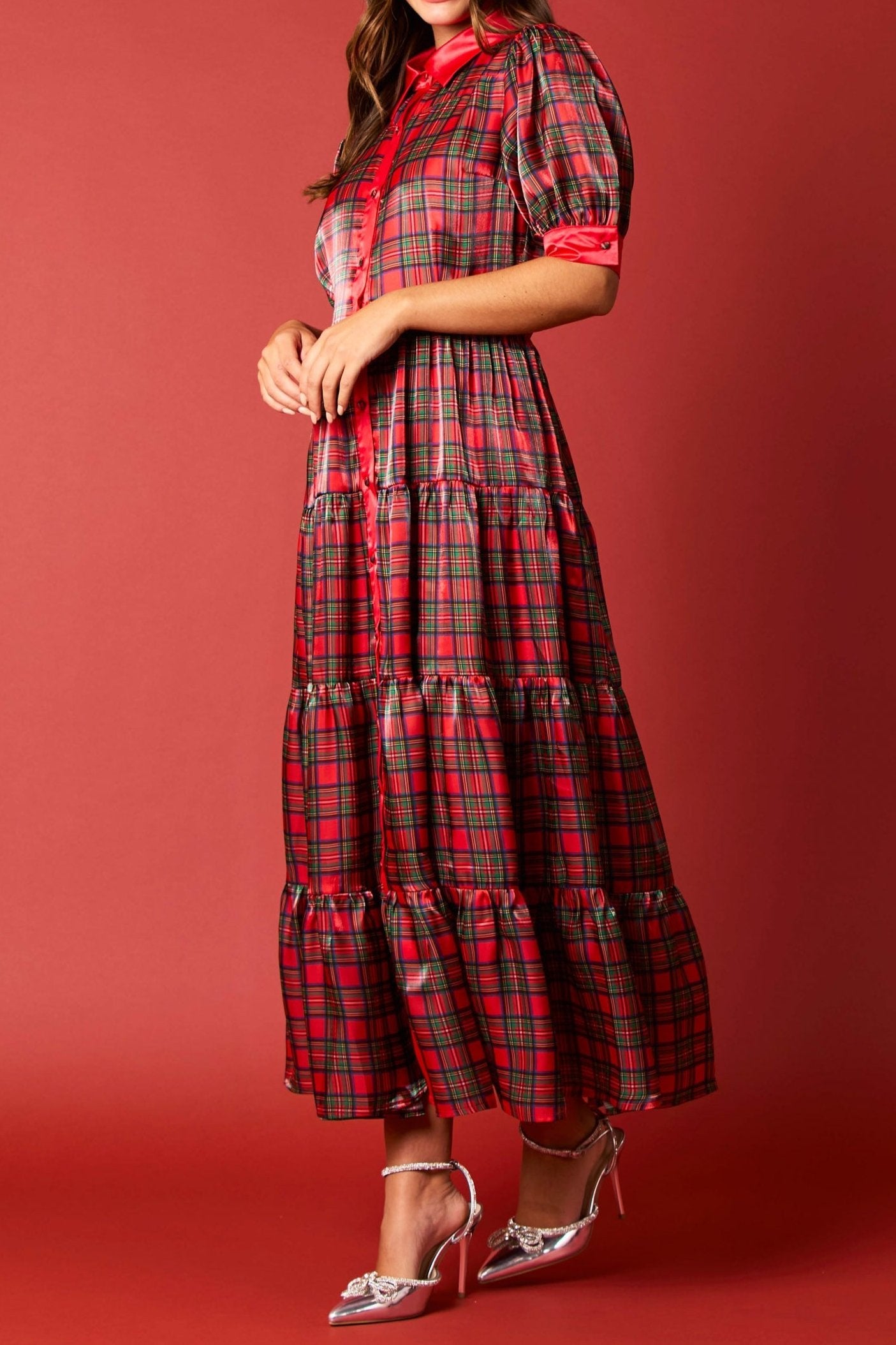 Holiday Festivity Dress - Midi Length
Red Multi Tartan Plaid Print, Polyester, Classic and Flowy Fit with Slight Stretch, Puff 3/4 Length Sleeves with Plaid Printed Button on Cuffs. Collared Neckline, Button Front with Buttons Down Length of Front of Dress - Buttons are Plaid Print, Silky Finish, Elastic Waist, Tiered Style