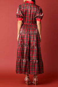 Back View of Holiday Festivity Dress - Midi Length
Red Multi Tartan Plaid Print, Polyester, Classic and Flowy Fit with Slight Stretch, Puff 3/4 Length Sleeves with Plaid Printed Button on Cuffs. Collared Neckline, Button Front with Buttons Down Length of Front of Dress - Buttons are Plaid Print, Silky Finish, Elastic Waist, Tiered Style