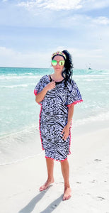 It’s All About The Print Swimdress in Animal Print with cute pom poms - In Stock - Blessed To Bless Boutique