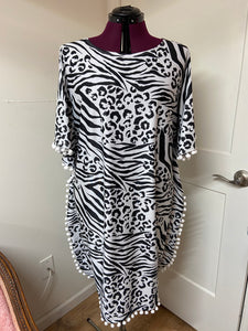 It’s All About The Print Swimdress in Animal Print with cute pom poms - In Stock - Blessed To Bless Boutique