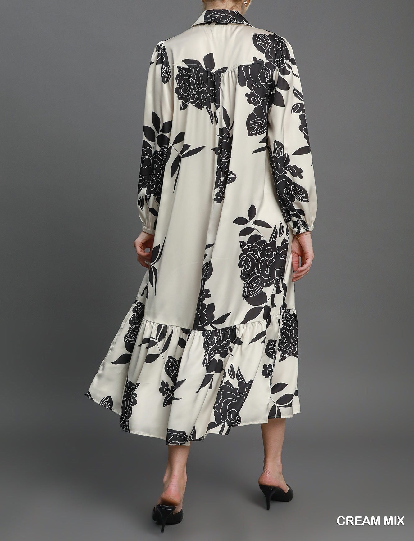 Back View of Floral Class Dress In Cream & Black - In Stock - Cream Color with Black Floral Detail, Collared Neckline, Button Front, Elastic Sleeve Cuffs, Long Sleeves, Pleated Near Bottom of Skirt