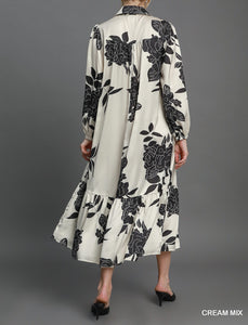 Back View of Floral Class Dress In Cream & Black - In Stock - Cream Color with Black Floral Detail, Collared Neckline, Button Front, Elastic Sleeve Cuffs, Long Sleeves, Pleated Near Bottom of Skirt