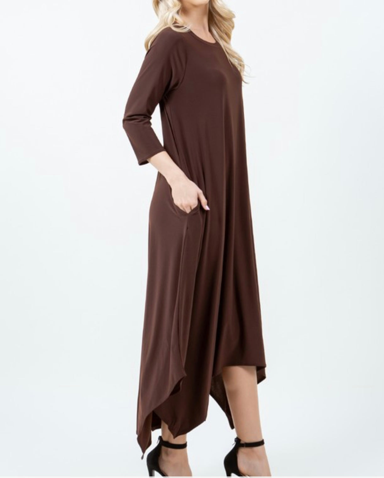 Side/Front View of Simply Brown-Tastic Maxi Dress in Brown with 3/4 length sleeves and handkerchief bottom.