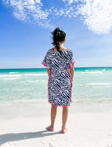 It’s All About The Print Swimdress in Animal Print with cute pom poms - In Stock - Blessed To Bless Boutique