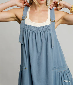 Detail View of Denim Color - Darling in Denim Overall Dress - Midi Length with Smocked Neckline, Back Bow Detail, & Pockets