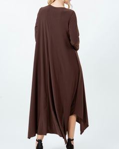 Back View of Simply Brown-Tastic Maxi Dress in Brown with 3/4 length sleeves and handkerchief bottom.