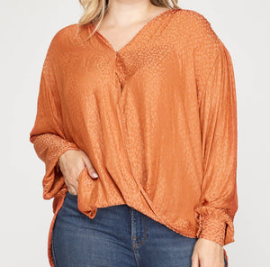 Rust Orange Color - V-Neck Neckline, Long Dolman Sleeve Top with Surplice Crossover Bodice Style, Shiny Leopard Print, Wide Cuffs on Sleeves, Side Slits on Bottom of Top