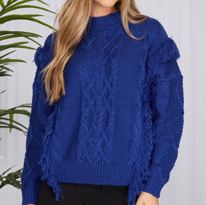 Cobalt Blue Color - Be Bold in Blue Sweater Top - Sweater Knit Fabric - Comfy and Relaxed Fit with Good Stretch - Cable Knit Style on Front, Simple and Classic Sweater Style on Back - High Neck Neckline
Long Sleeves with Ribbed Cuffs
Tassel/Fringe Detail Runs From Bottom of Sweater Up the Sides of Bodice, then Across Upper Arm Sleeve Down the Back of the Sweater on Each Side