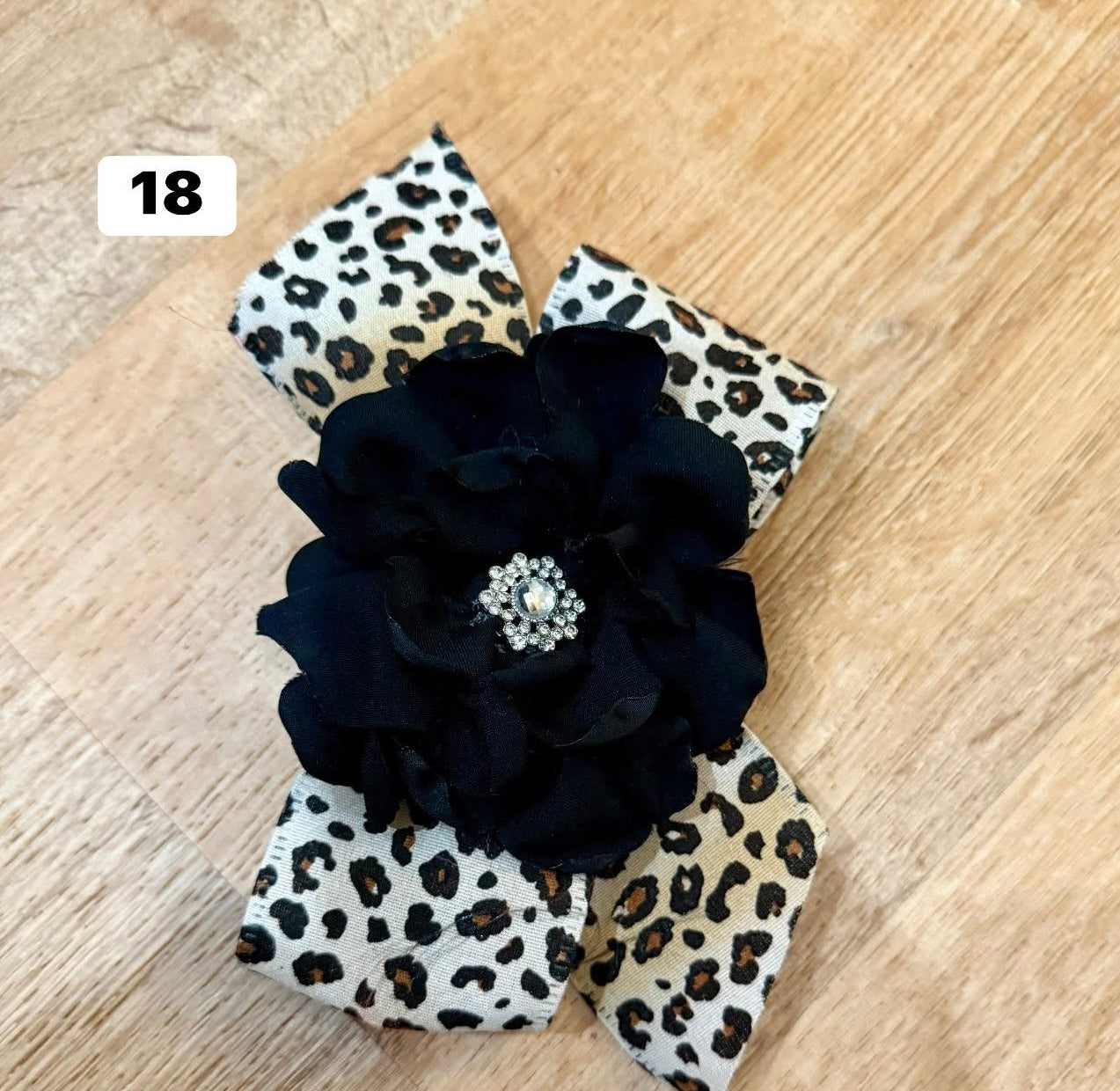 Black Bloom Leopard Bow Brooch