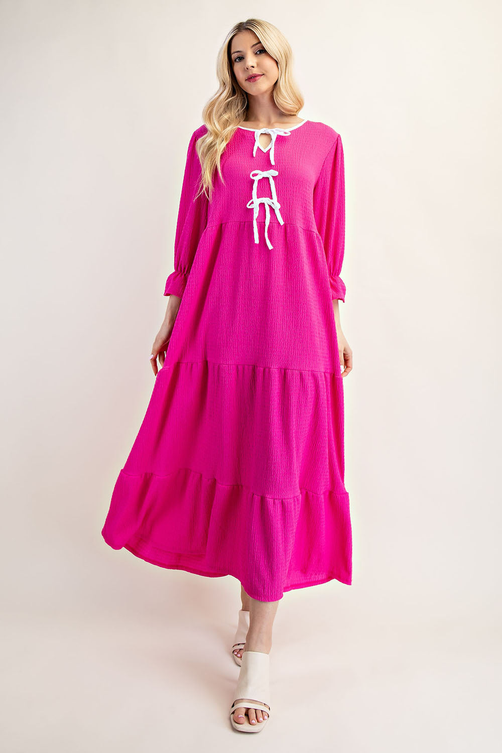 Fuchsia dress with white bows 