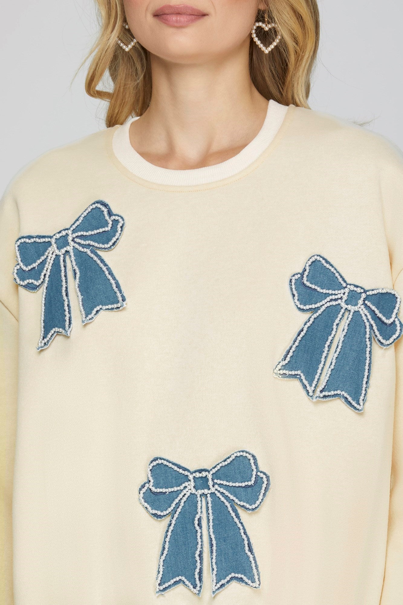 Detail View of Cream Color - Our Beautiful Bows Sweatshirt