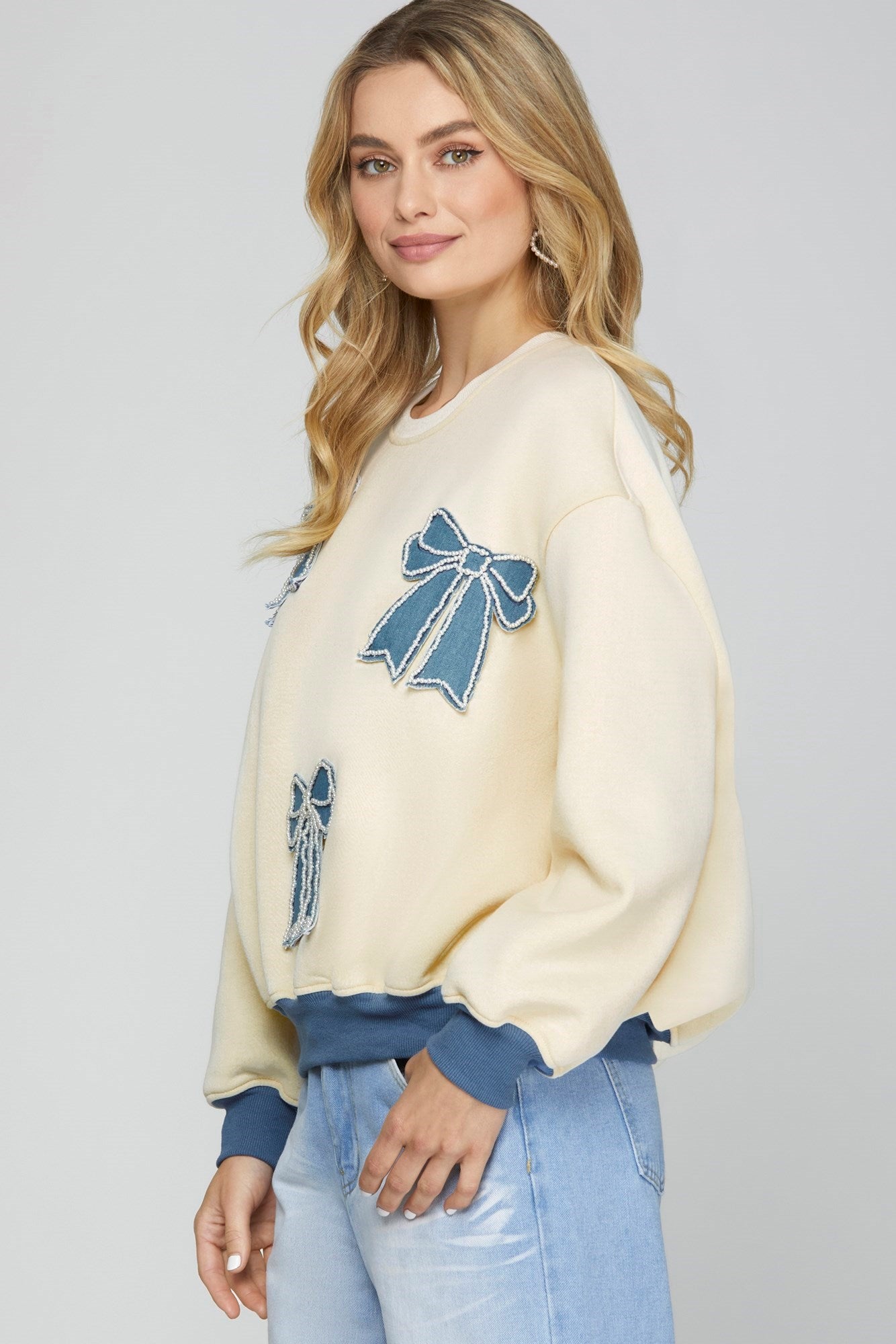 Side View of Cream Color - Our Beautiful Bows Sweatshirt