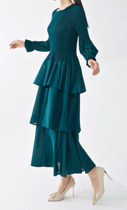 Side View of Green Tiered One Size Dress with Pleated Detail and Ruffled Skirt