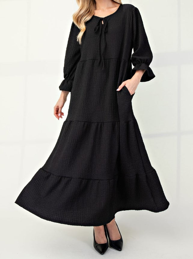 Black Color - Tiered Maxi Dress with 3/4 Length Puff Sleeves and Ruffled Cuffs, Round Neckline with Keyhole Cutout and Detail Tying Bow