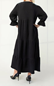 Back View of Black Color - Tiered Maxi Dress with 3/4 Length Puff Sleeves and Ruffled Cuffs, Round Neckline with Keyhole Cutout and Detail Tying Bow