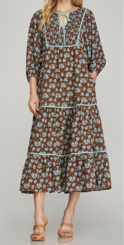 Brown Color - Midi Length, 3/4 Length Sleeves with Elastic Cuffs, Tiered Style, Brown with Soft Blue Floral Detail, Round Neckline with Keyhole Detail Opening with Tieable Tie