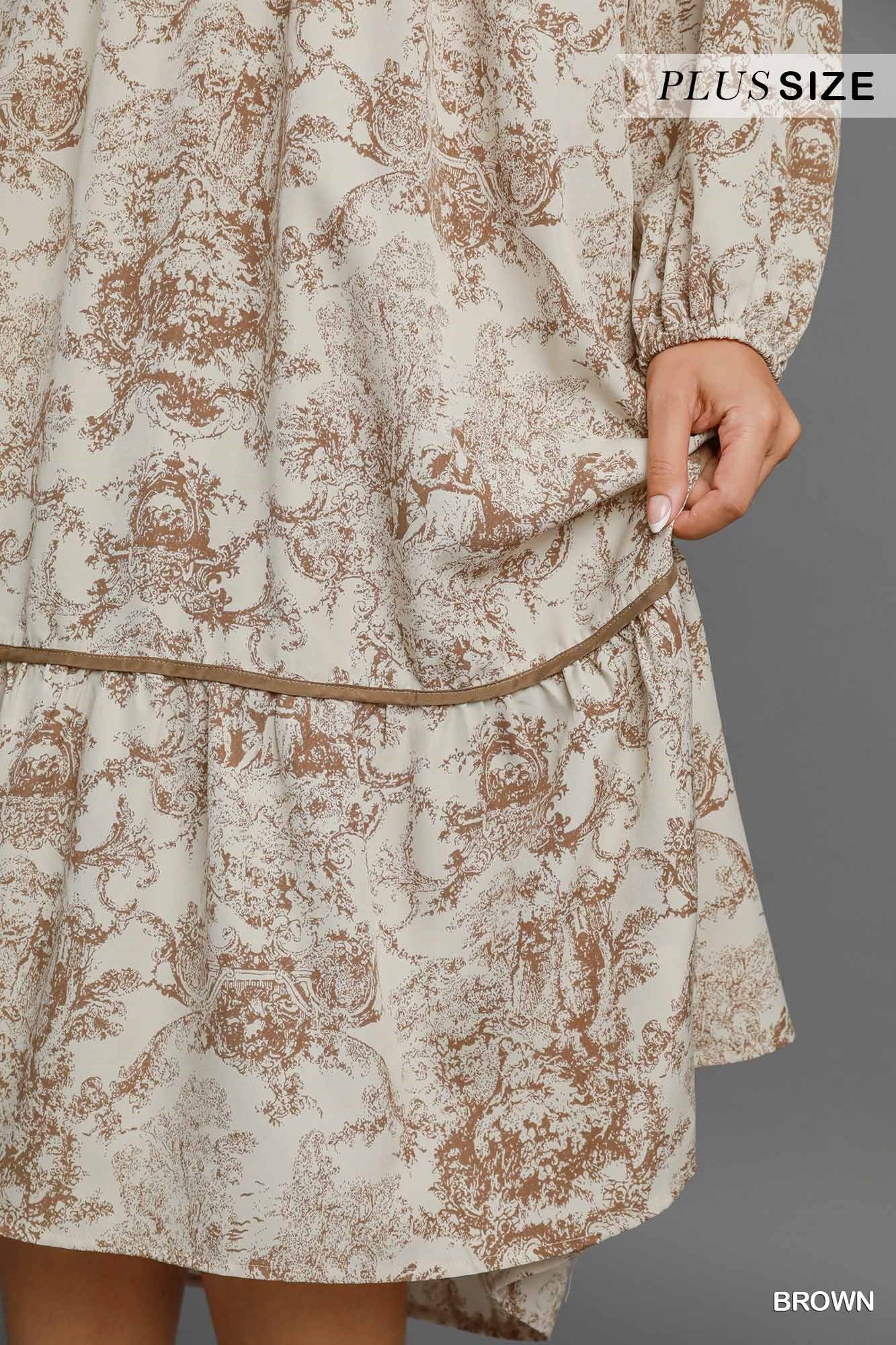 Detail View of Brown Color - Christmas Landscape Dress - Midi Length - Long Balloon Sleeves with Elastic Cuffs - V-Neck Neckline - Landscape Pattern - Embroider Details Around Top of Bodice and Around Lower Portion of Skirt