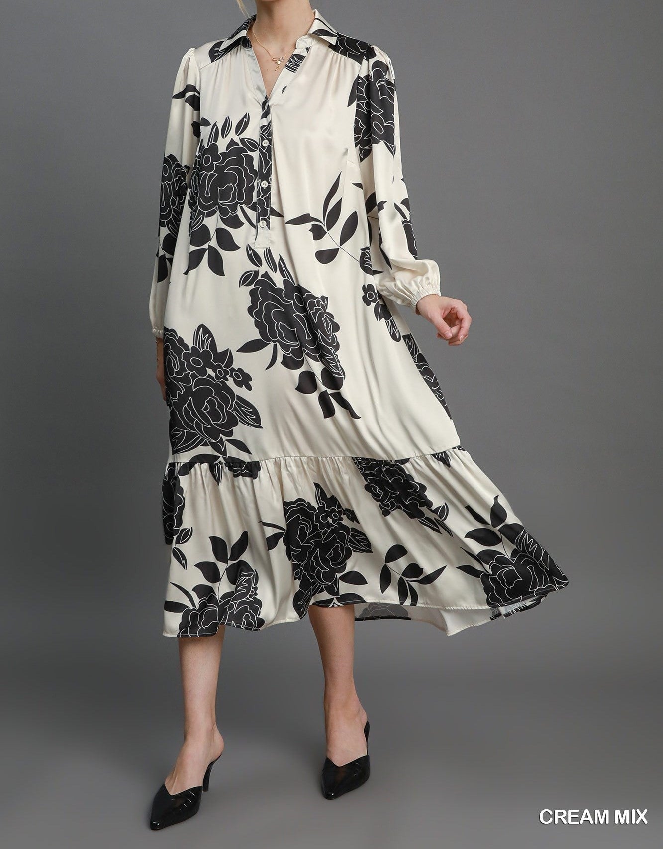 Floral Class Dress In Cream & Black - In Stock - Cream Color with Black Floral Detail, Collared Neckline, Button Front, Elastic Sleeve Cuffs, Long Sleeves, Pleated Near Bottom of Skirt