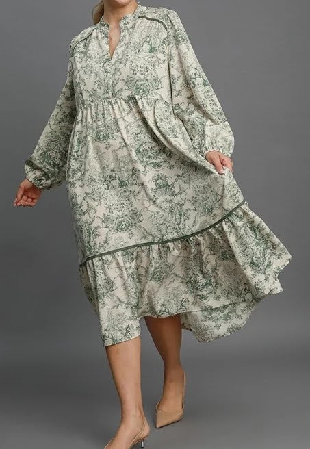 Forest Green Color - Christmas Landscape Dress - Midi Length - Long Balloon Sleeves with Elastic Cuffs - V-Neck Neckline - Landscape Pattern - Embroider Details Around Top of Bodice and Around Lower Portion of Skirt